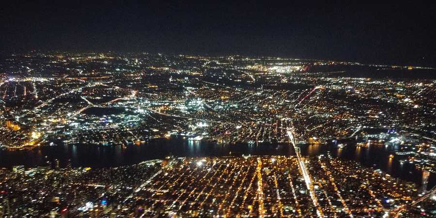 aerial-view-of-city-lights-at-night-depicting-the-electric-grid