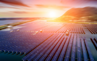 solar-farm-with-sunset-in-background