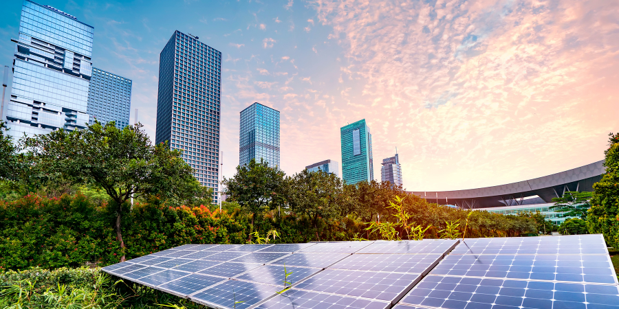 solar-panels-near-city-skyline