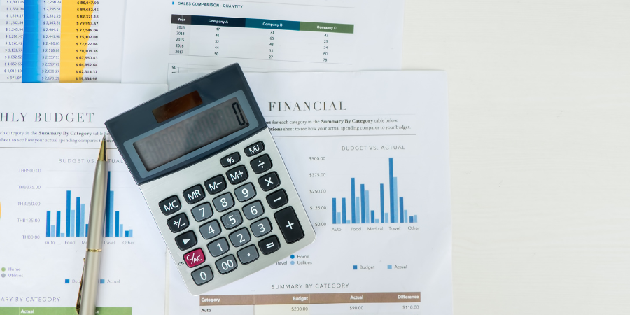 calculator-lying-on-financial-reports