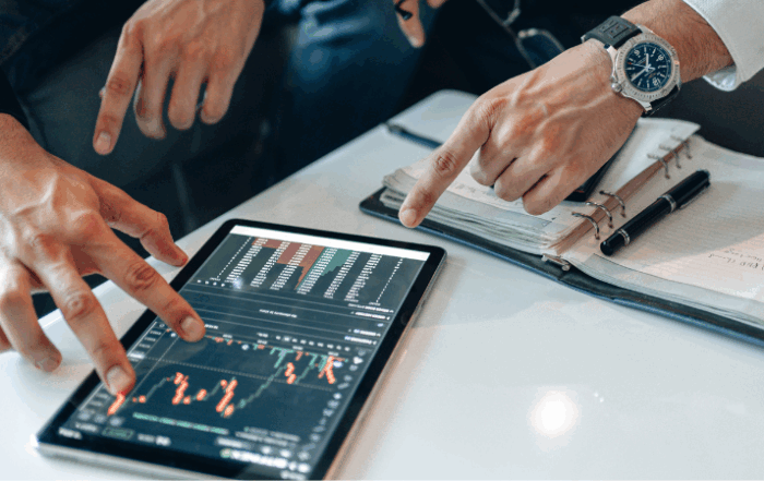 men-reviwing-energy-usage-charts-and-prices-on-a-tablet
