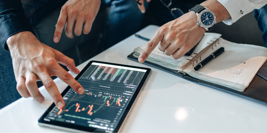 men-reviwing-energy-usage-charts-and-prices-on-a-tablet